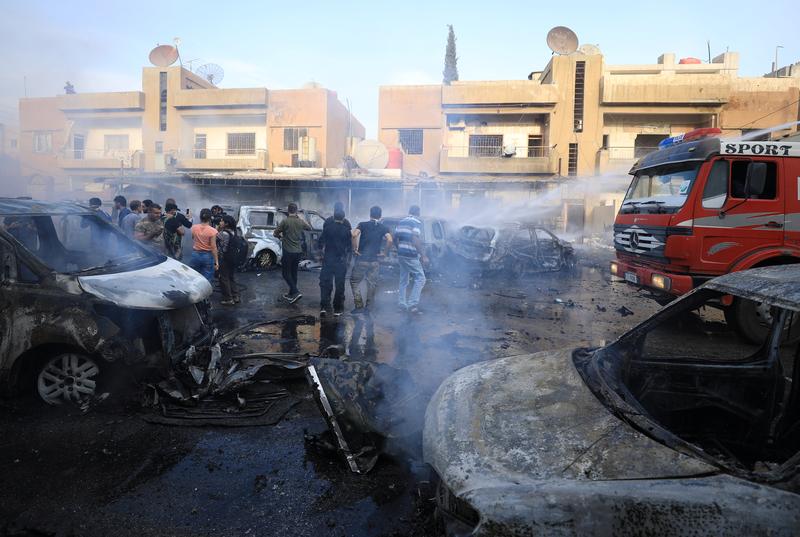 omb blast kills many at shrine near Syrian capital, site of peace